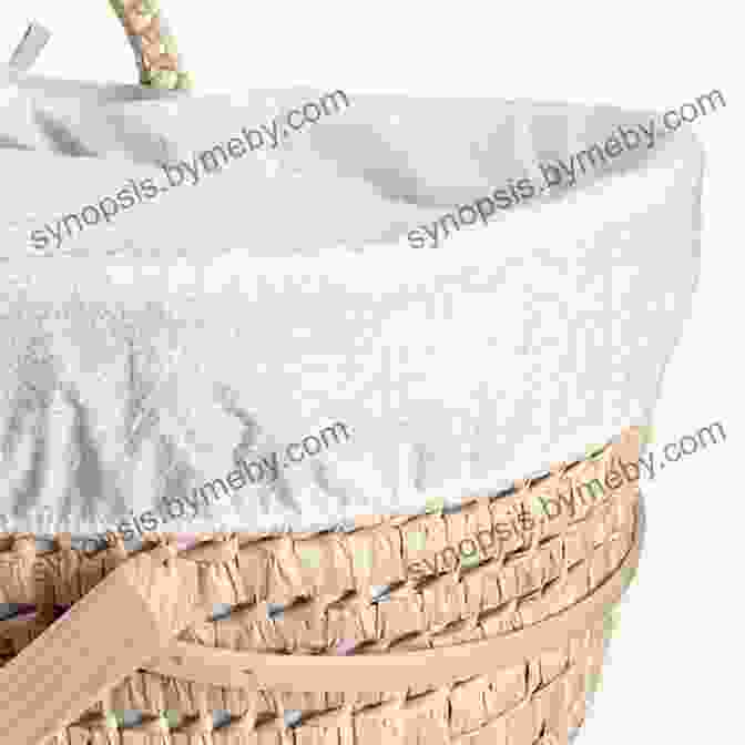 A Beautifully Knitted Moses Basket Cover In A Soft, Neutral Color, Adorned With Delicate Lace Details And A Cozy Pom Pom Trim. Knitting Pattern KP168 Moses Basket Cover